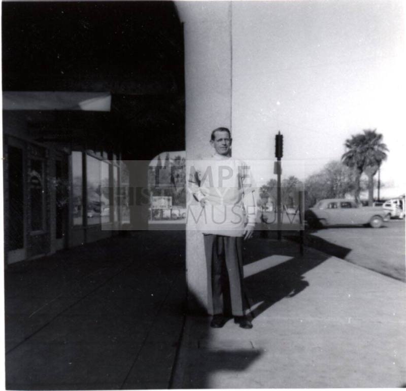 Barber in Corridor near Pioneer Camera & Laird/Dines Drugstore