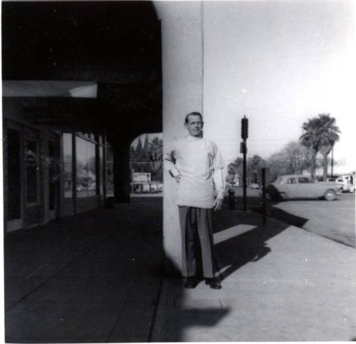 Barber in Corridor near Pioneer Camera & Laird/Dines Drugstore