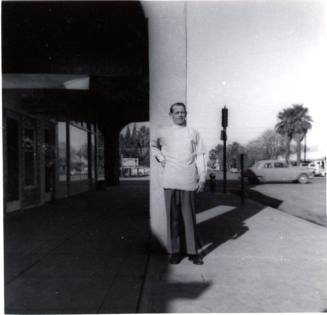 Barber in Corridor near Pioneer Camera & Laird/Dines Drugstore