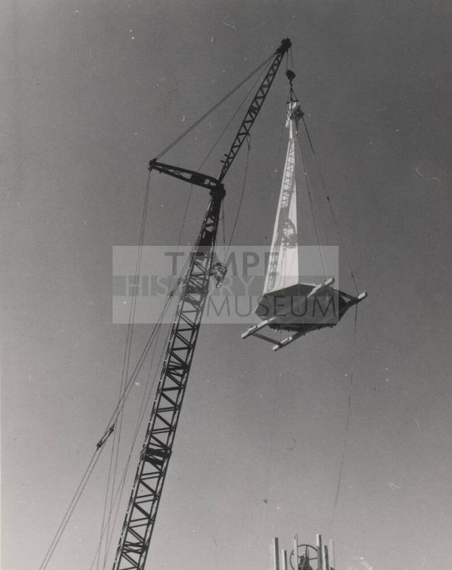 Photograph of the First Congregational Church of Tempe construction crane lowering steeple.