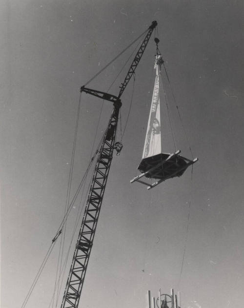 Photograph of the First Congregational Church of Tempe construction crane lowering steeple.