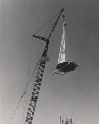 Photograph of the First Congregational Church of Tempe construction crane lowering steeple.