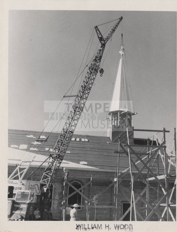 Photograph of the First Congregational Church of Tempe, lowering of new steeple.