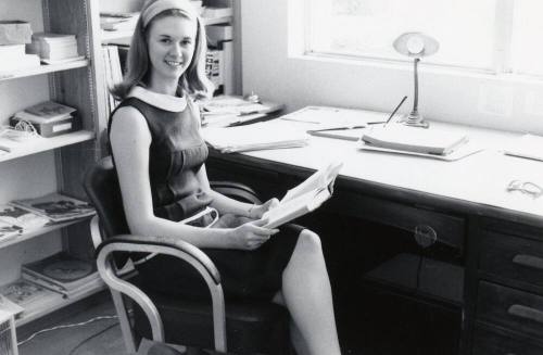 Young Girl at an office desk