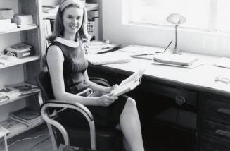 Young Girl at an office desk