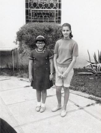 Two First Congregational Church Youth standing on pavers