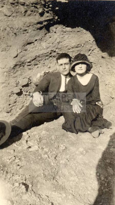 Harry and Josie Madera outside sitting on rocks