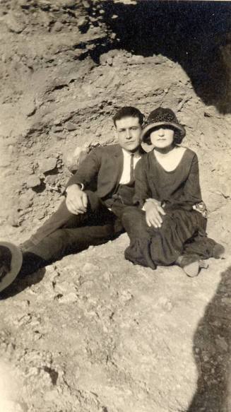 Harry and Josie Madera outside sitting on rocks