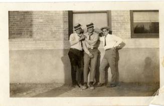 Ray Rodriguez and two unknown men