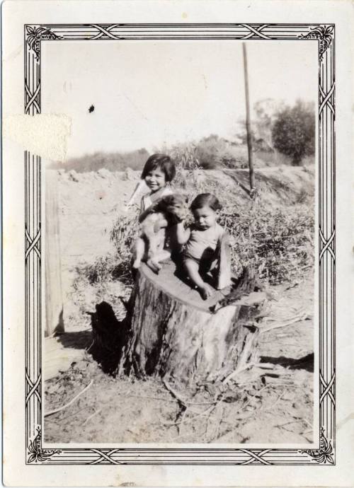 Marcie Rodriguez with a dog and Monica Rodriguez