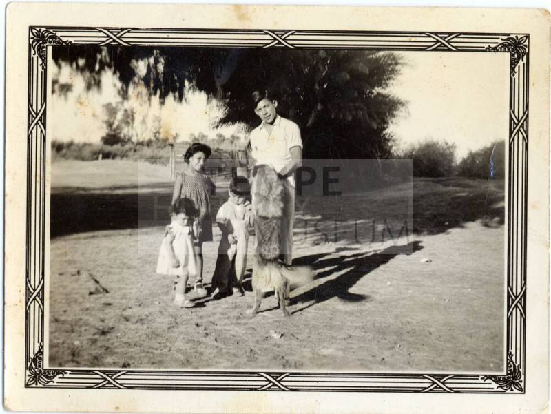 Marcie Rodriguez, Margie Rodriguez, and Ray Rodriguez, Sr. with a cousin