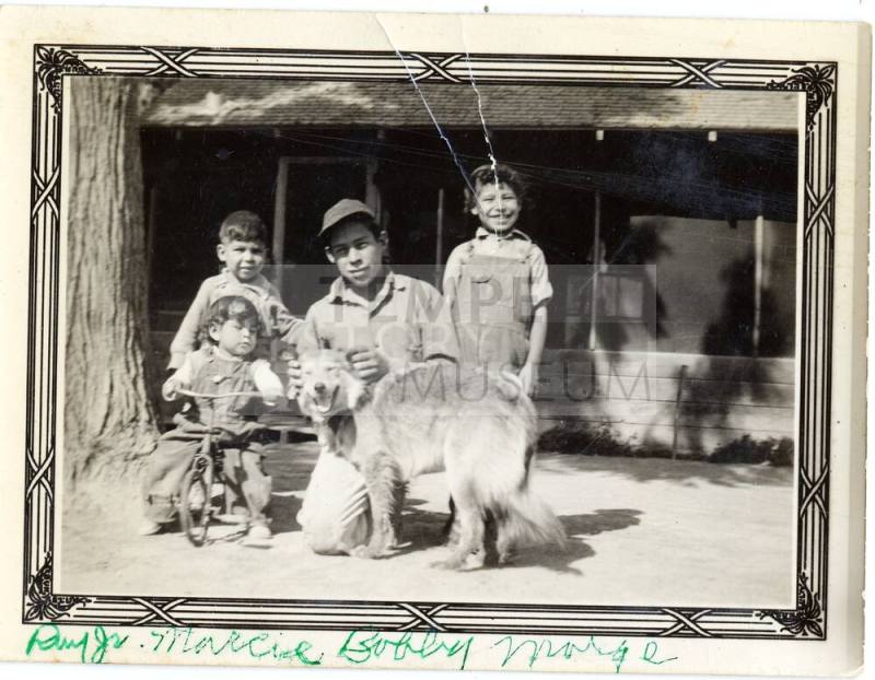 Ray Jr. , Marcie, Bobby and Marge with a dog