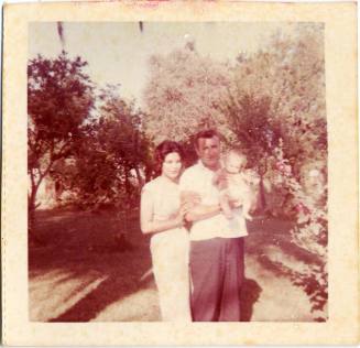 Marcie, James McLarney, and baby Damien McLarney at the Elias Rodriguez house