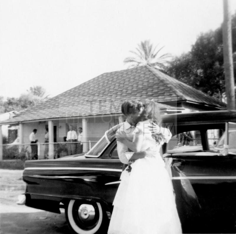 Just married couple in front of Elias-Rodriguez House