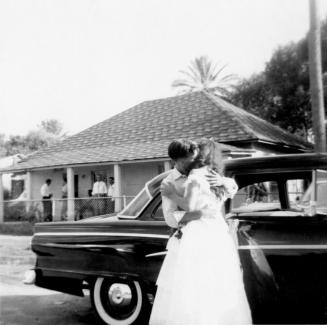Just married couple in front of Elias-Rodriguez House