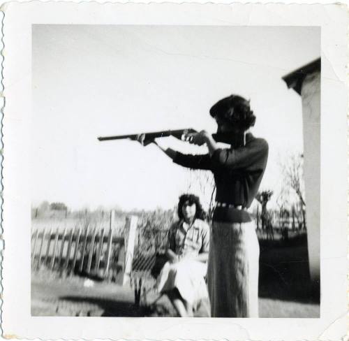 "Marcie, the cutest girl in Tempe" with a gun