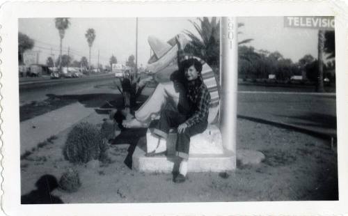 Genevieve Puerta at Van Buren motel sign, Phoenix