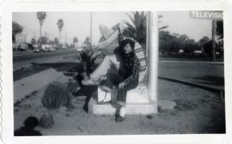 Genevieve Puerta at Van Buren motel sign, Phoenix