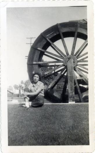 Katy Ramirez at motel water wheel on Van Buren Street, Phoenix
