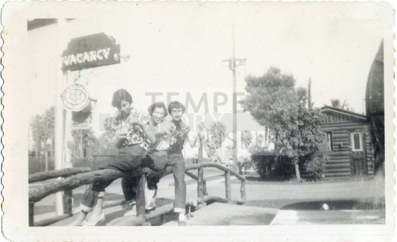 Marcie Rodriguez and friends in front of a  Van Buren motel, Phoenix