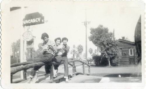 Marcie Rodriguez and friends in front of a  Van Buren motel, Phoenix