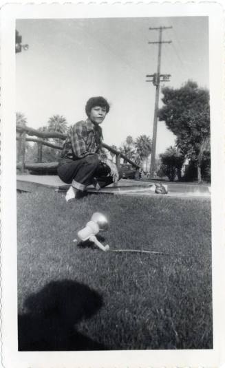Genevieve Puerta on lawn of a Van Buren motel, Phoenix