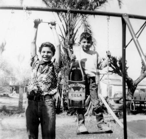 Marcie and Randy on a Playset