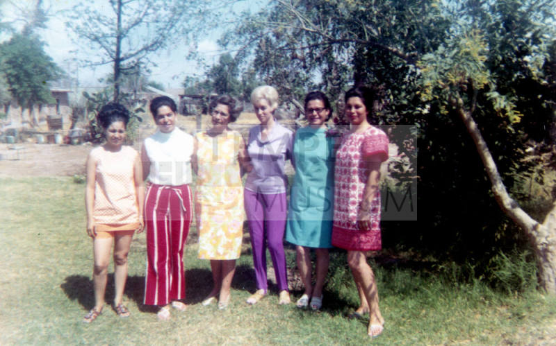 Irene Elias-Rodriguez and women by trees
