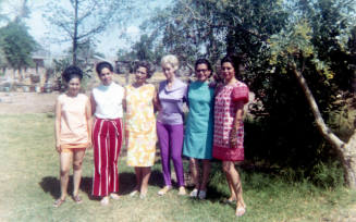 Irene Elias-Rodriguez and women by trees