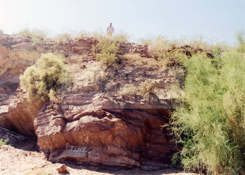 Man at Hayden Butte Rock Formation