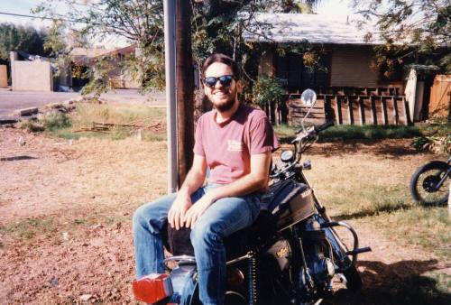 Chris Losey Sits on Motorcycle