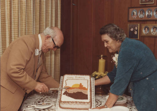 Howard Pyle Cutting Birthday Cake