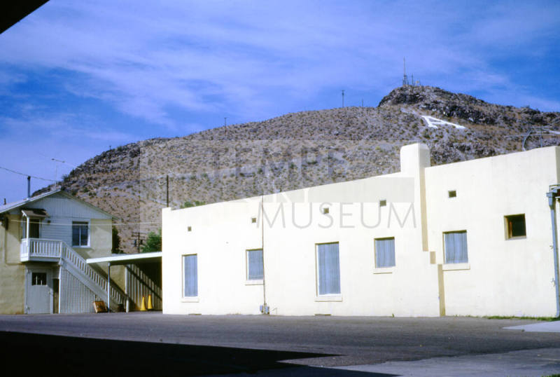 Buildings east of Mill Ave., no site address