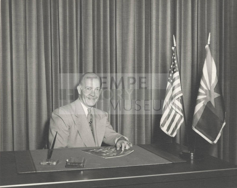 Howard Pyle at Desk with U.S. and AZ Flags