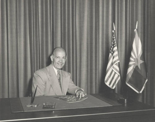 Howard Pyle at Desk with U.S. and AZ Flags