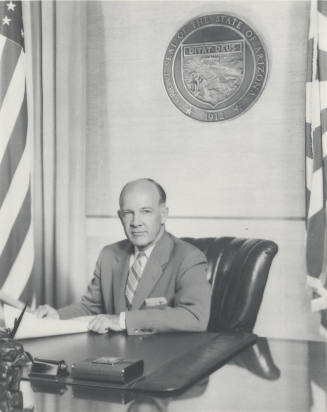 Portrait of Governor Howard Pyle at Desk