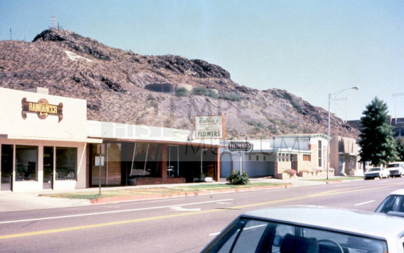 Businesses along North side of E. 5th St.