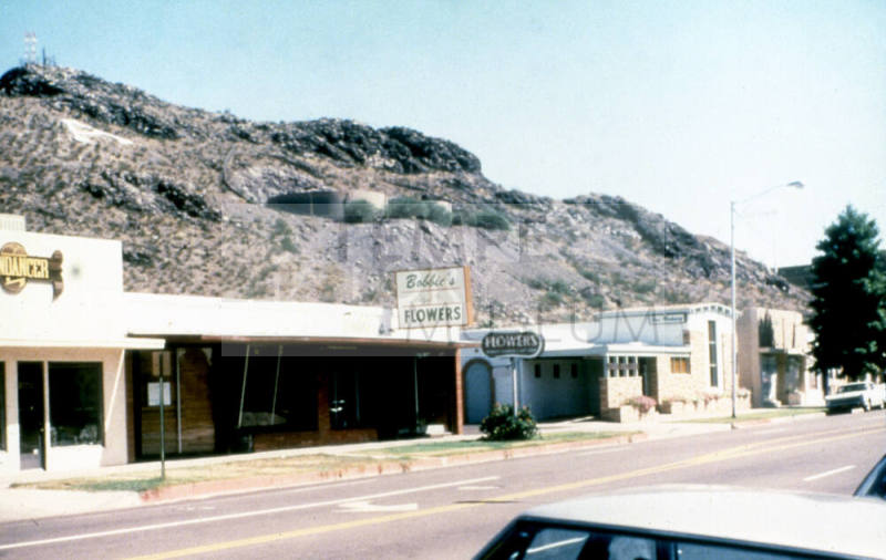 Businesses along North side of E. 5th St