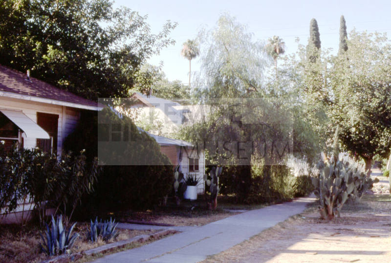Houses at 201 E. 6th St. and 609 S. Forest Intersection