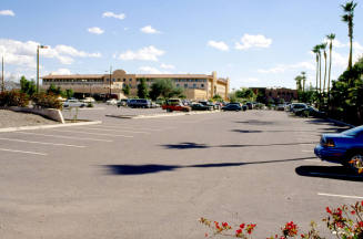 60 E. 5th Street, Mission Palms and parking lot