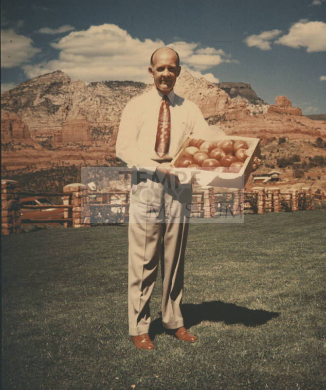 Howard Pyle Holds Box of Apples- Sedona