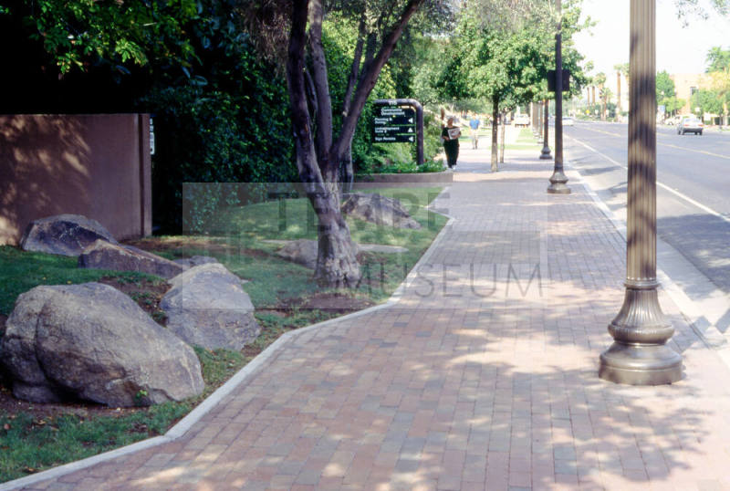 Sidewalk, 115 E. 5th St.