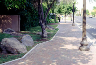 Sidewalk, 115 E. 5th St.