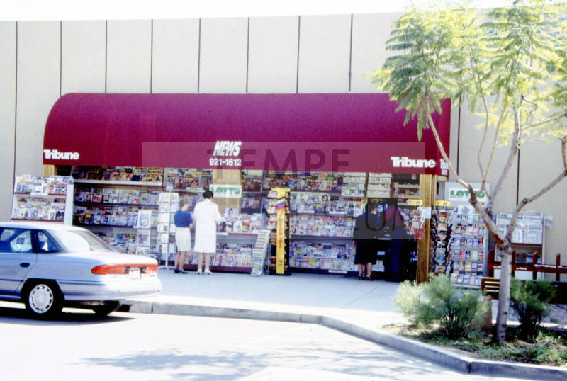 01 Block E. 6th Street - Tribune News Stand