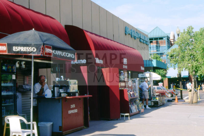 01 Block E. 6th Street - Tribune newsstand and Zio's expresso coffee shop