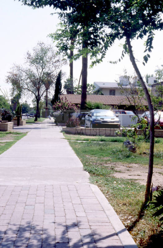 Street view, sidewalk and residences