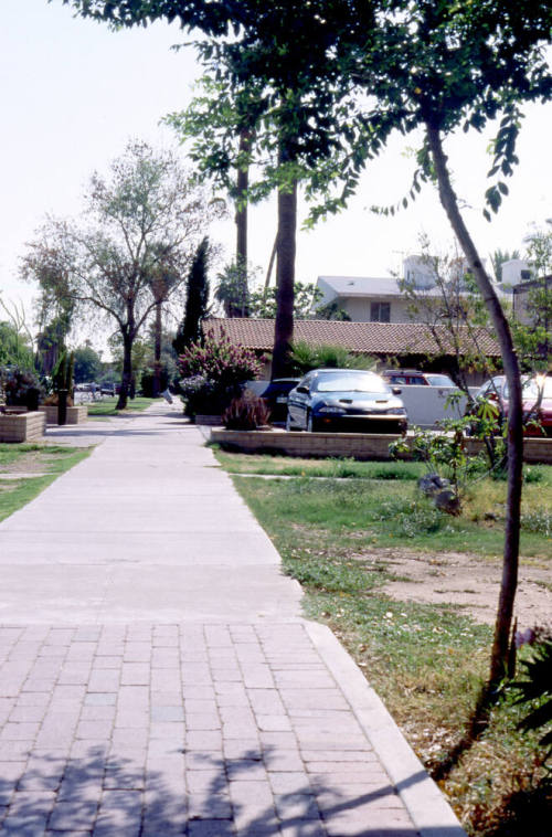 Street view, sidewalk and residences