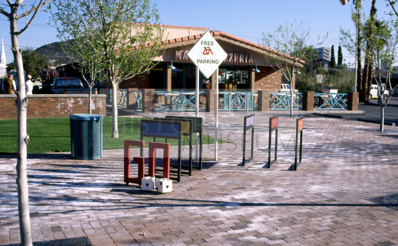 Monopoly Board Bike Rack, 100 block E. University Dr.