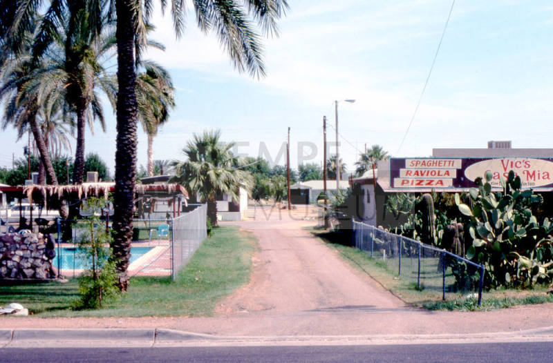 7 Palms Motel and Vic's Casa Mia alley, 2046 E. Apache