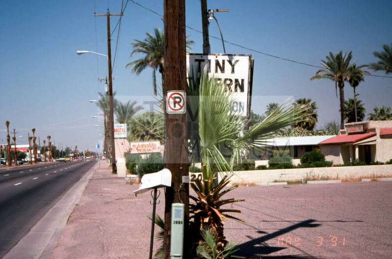 Signs of 7 Palms Motel and Tiny Tavern, 2058 E. Apache